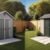Resin Shed vs Wood Shed comparison in a modern backyard